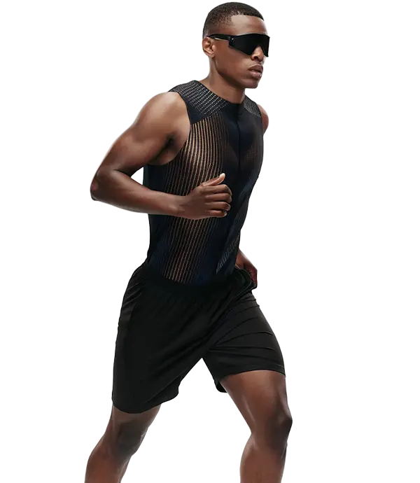 Black male runner in athletic wear and sunglasses